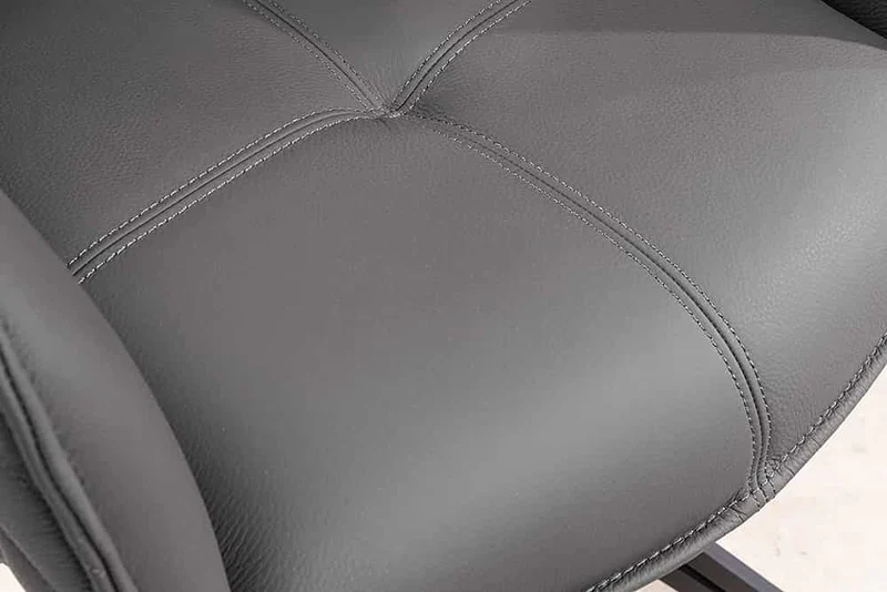 Eleganter Drehstuhl HORA Echtleder grau Metallgestell schwarz Armlehne