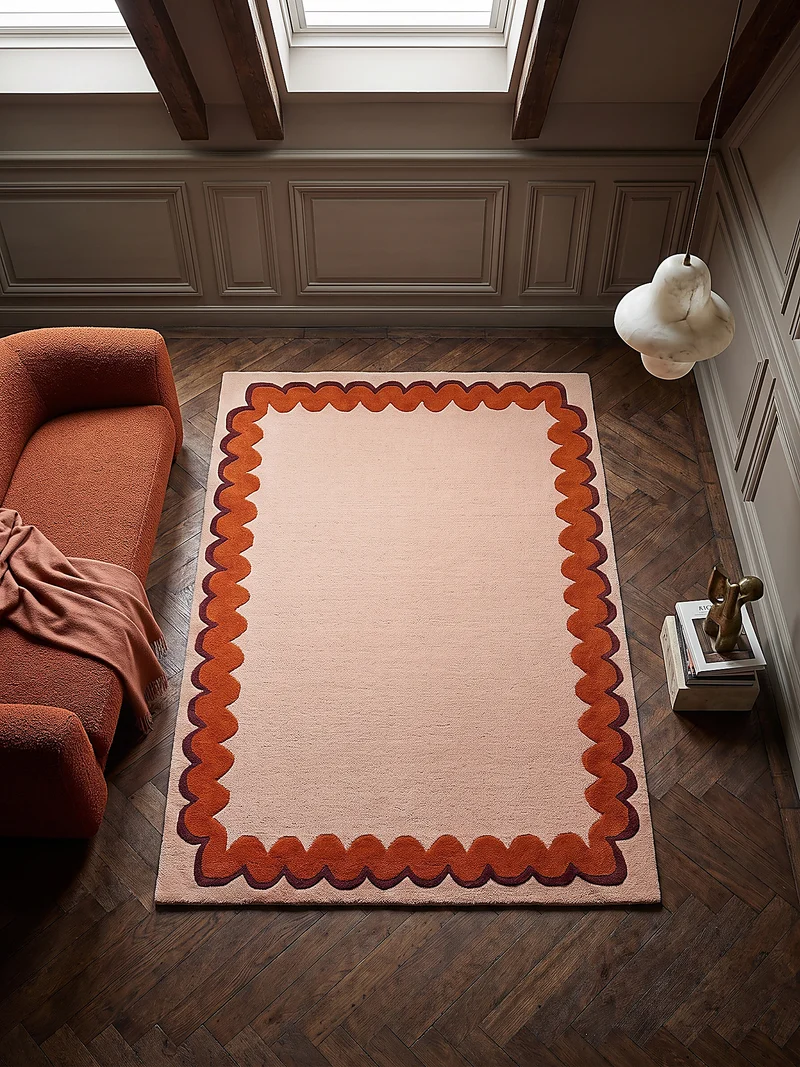 Wollteppich mit Wellenrand · handgetuftet, 5 mm Flor · 3.250 g/m²