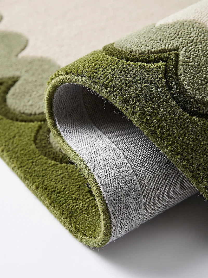 Wollteppich mit Wellenrand · handgetuftet, 5 mm Flor · 3.250 g/m²