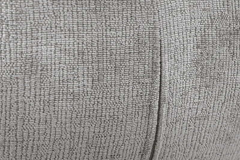 Retro Drehstuhl UNICO grau Chenille schwarzes Metallgestell Armlehne