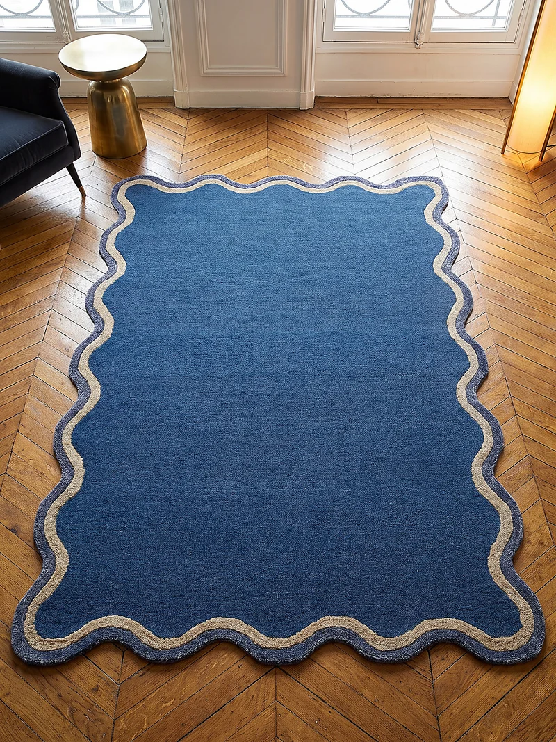 Wollteppich mit Wellenbordüre · handgetuftet · 8 mm Flor, 2.900 g/m²