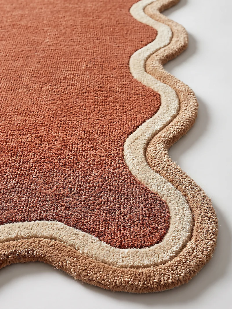 Wollteppich mit Wellenbordüre · handgetuftet · 8 mm Flor, 2.900 g/m²