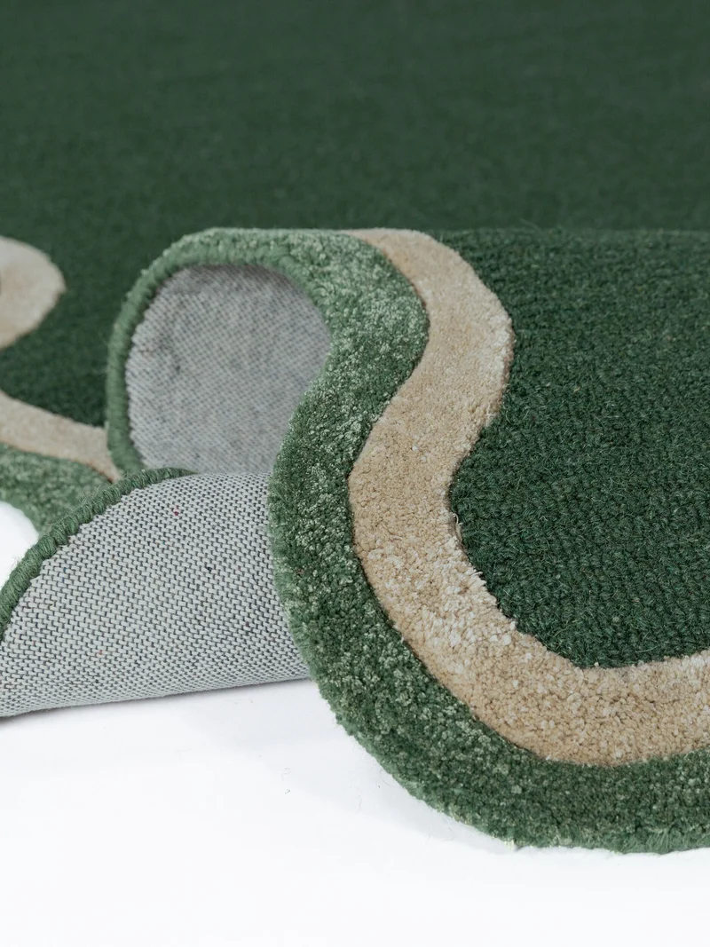 Wollteppich mit Wellenbordüre · handgetuftet · 8 mm Flor, 2.900 g/m²