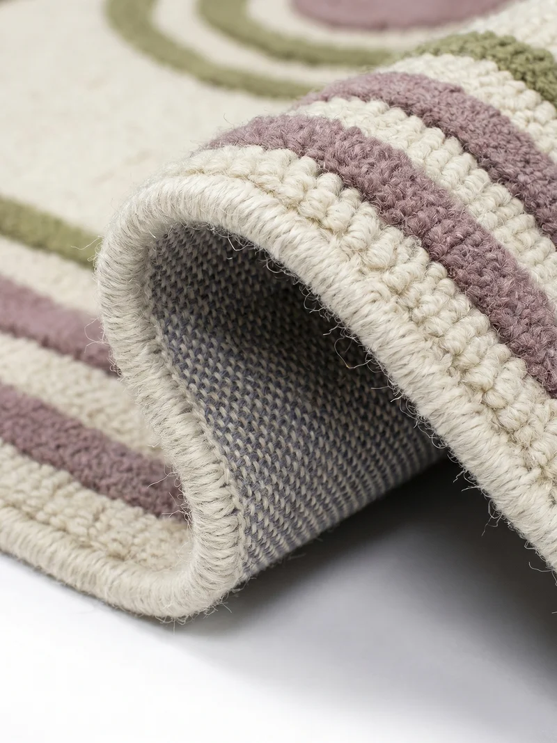 Wollteppich Spiralform · 100 % Wolle · handgetuftet