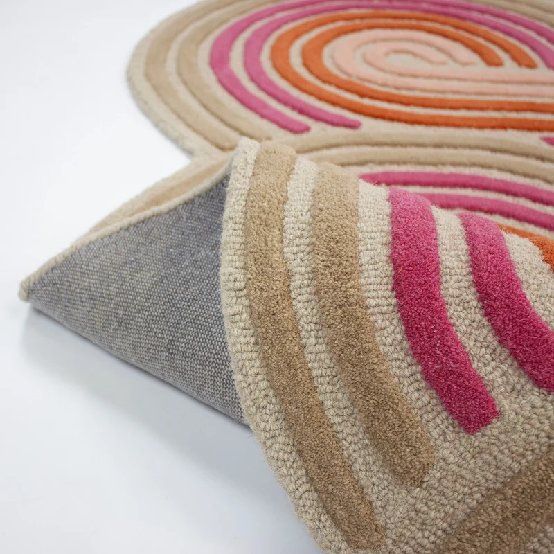 Wollteppich Spiralform · 100 % Wolle · handgetuftet