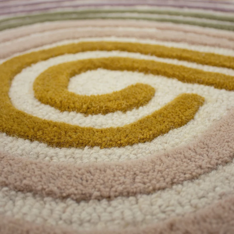 Wollteppich Spiralform · 100 % Wolle · handgetuftet