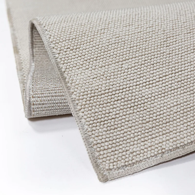 Waschbarer Flachgewebe-Teppich · Bouclé-Look · 100 % recyceltes Polyester · Hellgrau