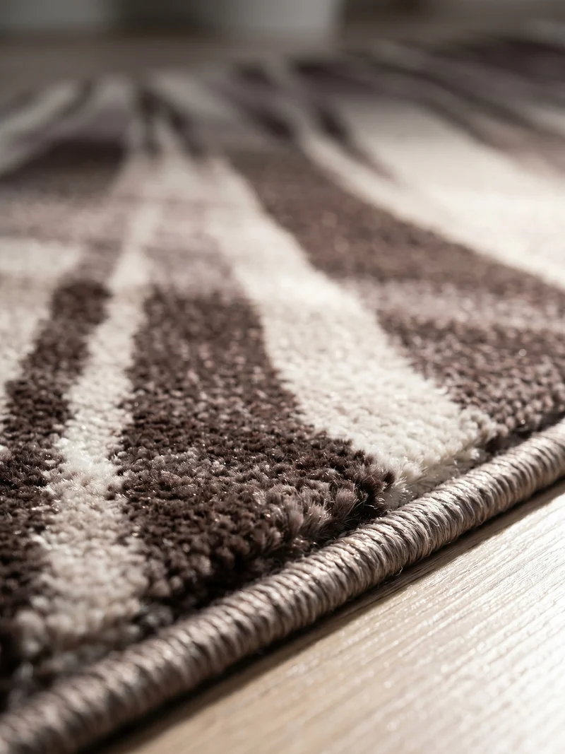 Kurzflor-Teppich Schwunglinien – Waschbar | Dynamisches Wellendesign | Heatset-Veredelung für Wolloptik