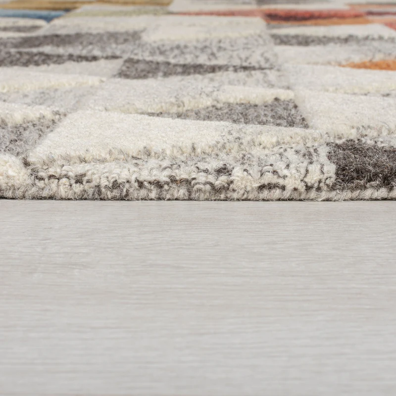 Getufteter Wollteppich Dreiecksmosaik · 100 % Wolle · 10 mm Kurzflor