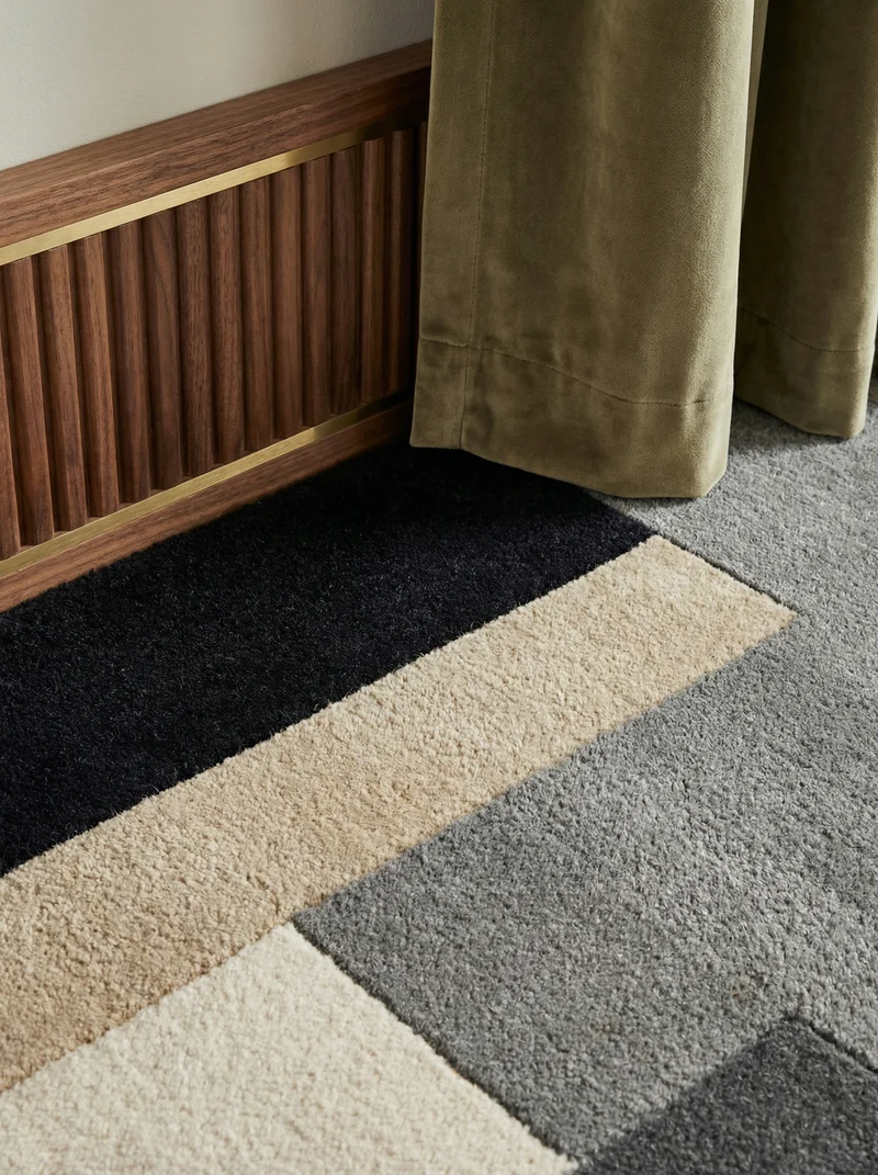 Wollteppich Cut-Out-Geometrie · 100 % Wolle · 10 mm Kurzflor