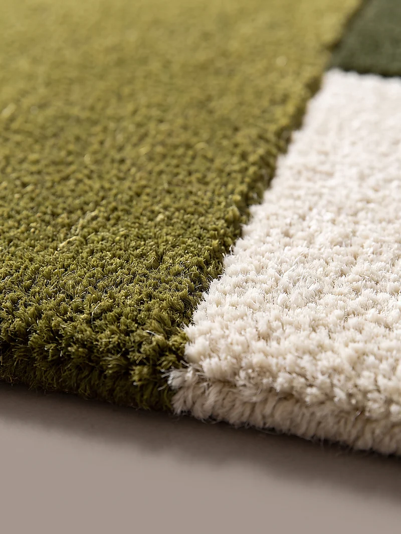 Wollteppich Cut-Out-Geometrie · 100 % Wolle · 10 mm Kurzflor