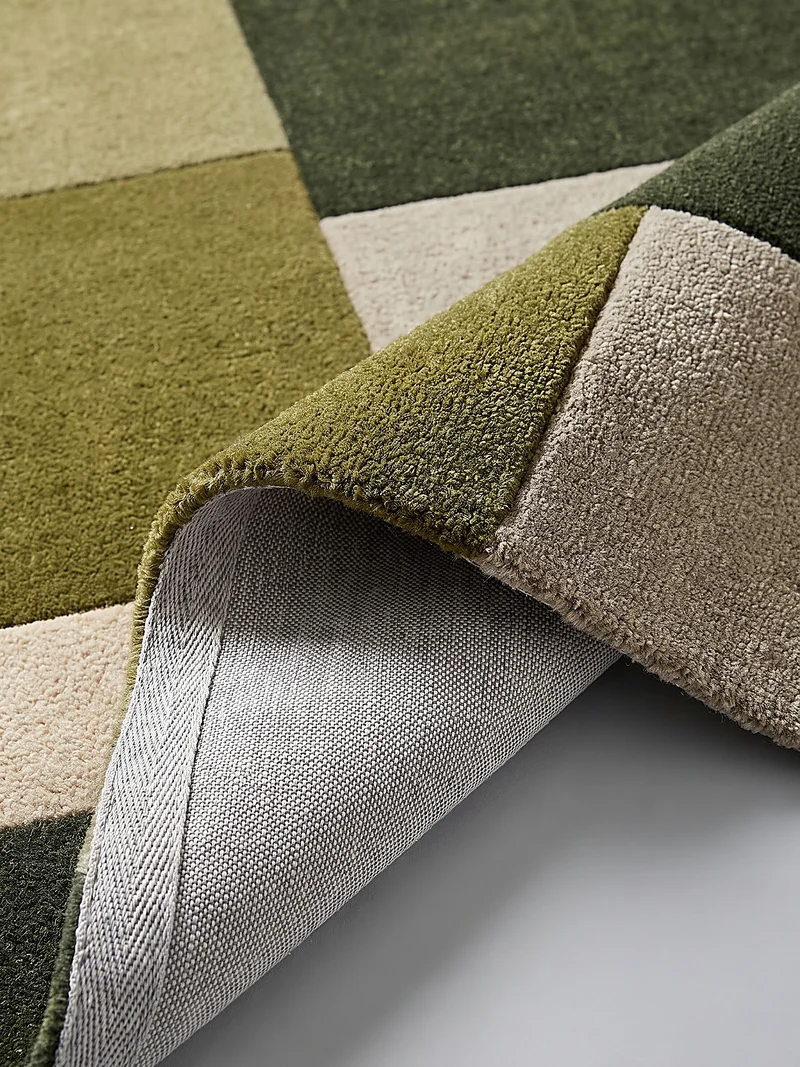 Wollteppich Cut-Out-Geometrie · 100 % Wolle · 10 mm Kurzflor