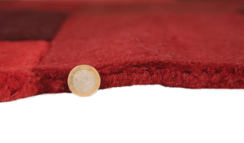 Wollteppich Cut-Out-Geometrie · 100 % Wolle · 10 mm Kurzflor