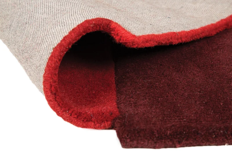 Wollteppich Cut-Out-Geometrie · 100 % Wolle · 10 mm Kurzflor