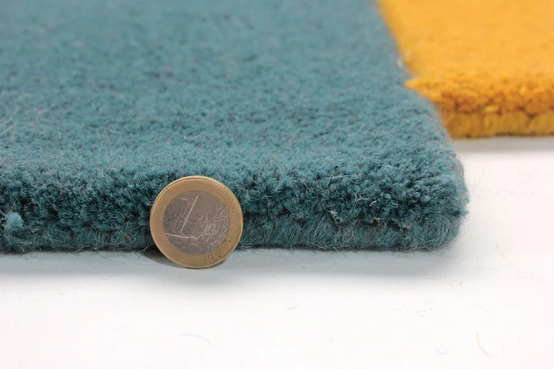 Wollteppich Cut-Out-Geometrie · 100 % Wolle · 10 mm Kurzflor