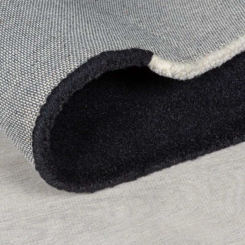 Wollteppich Cut-Out-Geometrie · 100 % Wolle · 10 mm Kurzflor