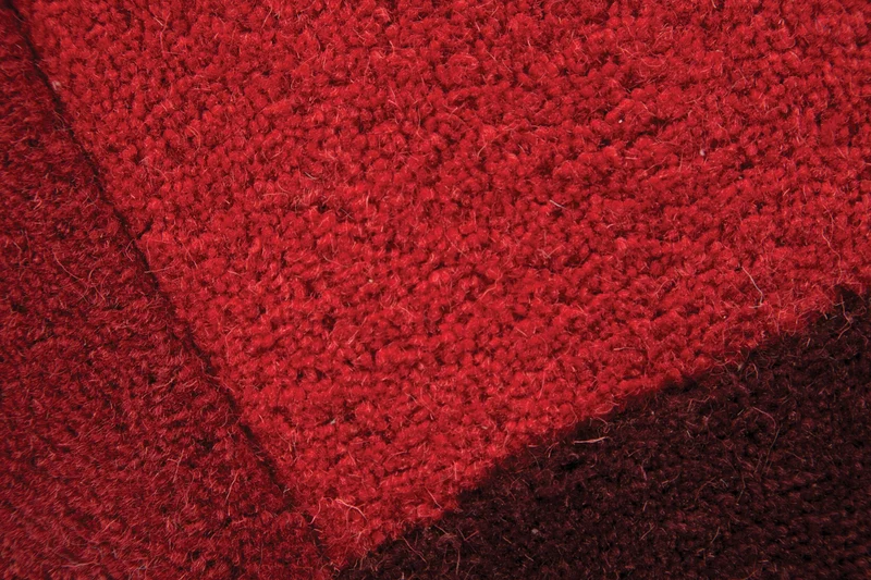 Wollteppich Cut-Out-Geometrie · 100 % Wolle · 10 mm Kurzflor