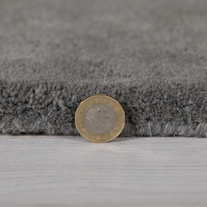 Wollteppich Cut-Out-Geometrie · 100 % Wolle · 10 mm Kurzflor