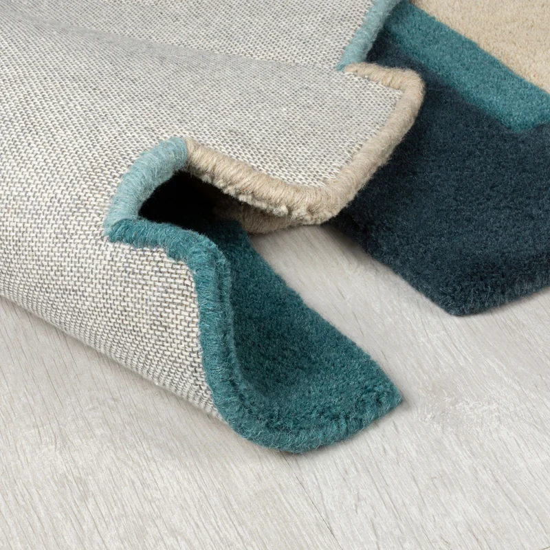 Wollteppich Cut-Out-Geometrie · 100 % Wolle · 10 mm Kurzflor