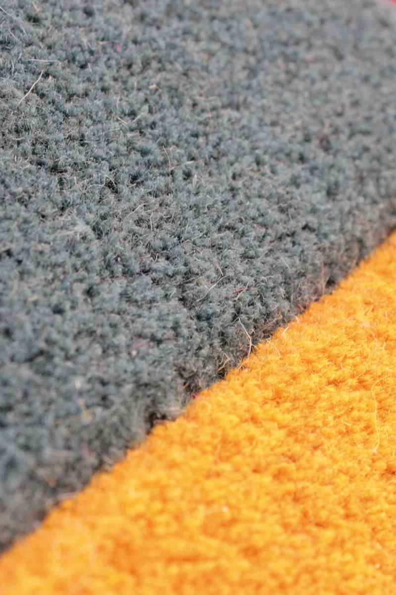Wollteppich Cut-Out-Geometrie · 100 % Wolle · 10 mm Kurzflor
