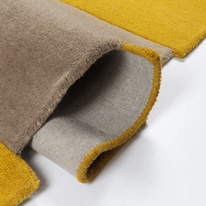 Wollteppich Cut-Out-Geometrie · 100 % Wolle · 10 mm Kurzflor