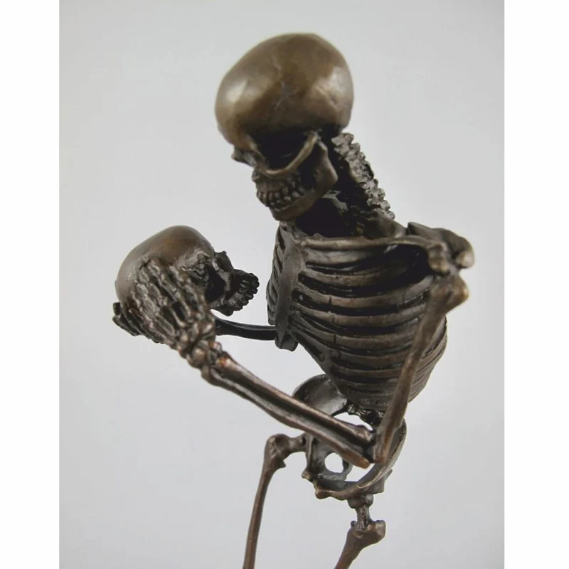 Casa Padrino Bronze Deko Skulptur Skelett H. 31 cm - Deko Accessoires