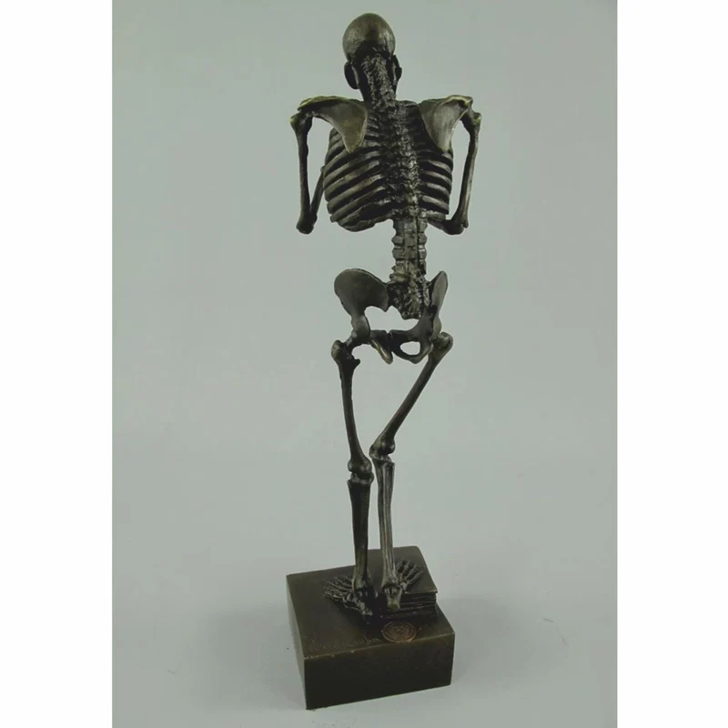 Casa Padrino Bronze Deko Skulptur Skelett H. 31 cm - Deko Accessoires