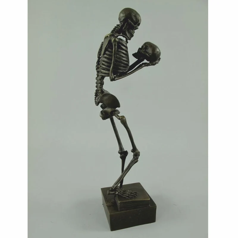 Casa Padrino Bronze Deko Skulptur Skelett H. 31 cm - Deko Accessoires