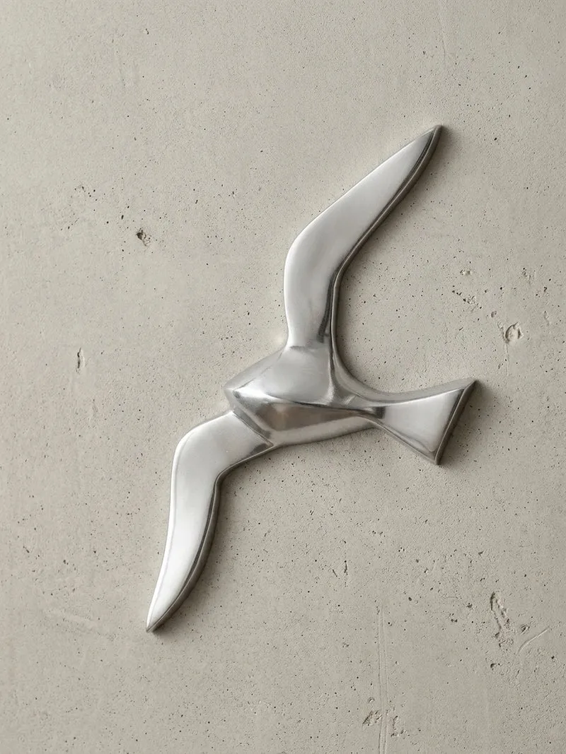 Wanddeko Möwe Aluminium silberfarben poliert 30 cm mit Wandhalterung