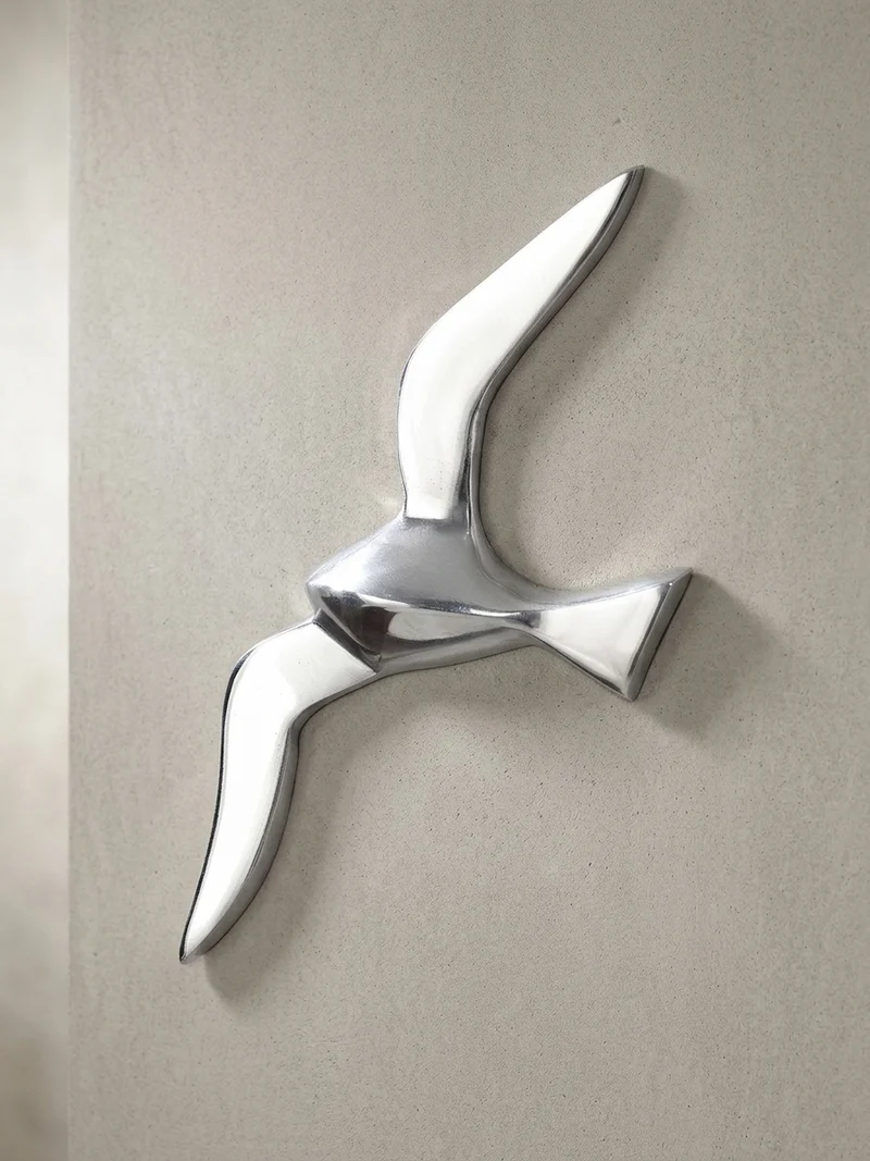 Wanddeko Möwe Aluminium silberfarben poliert 30 cm mit Wandhalterung