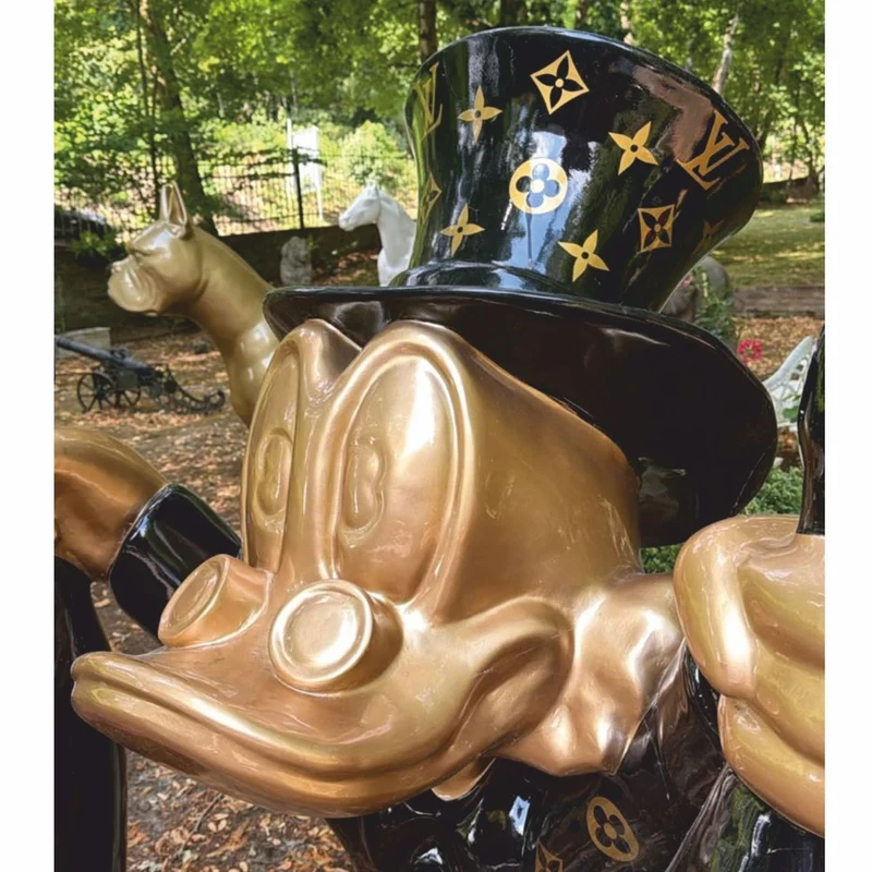 Casa Padrino XXL Deko Skulptur Ente Schwarz / Gold H. 170 cm - XXL Deko Figur - Garten Skulptur - Garten Figur