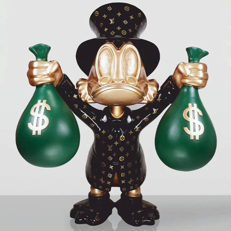 Casa Padrino Deko Figur Ente Schwarz / Gold / Grün H. 45 cm - Deko Skulptur