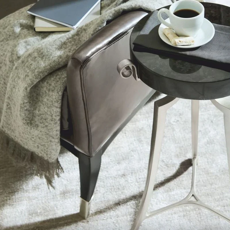 Casa Padrino Luxus Art Deco Leder Ohrensessel Braun / Schwarz / Silber H. 102 cm