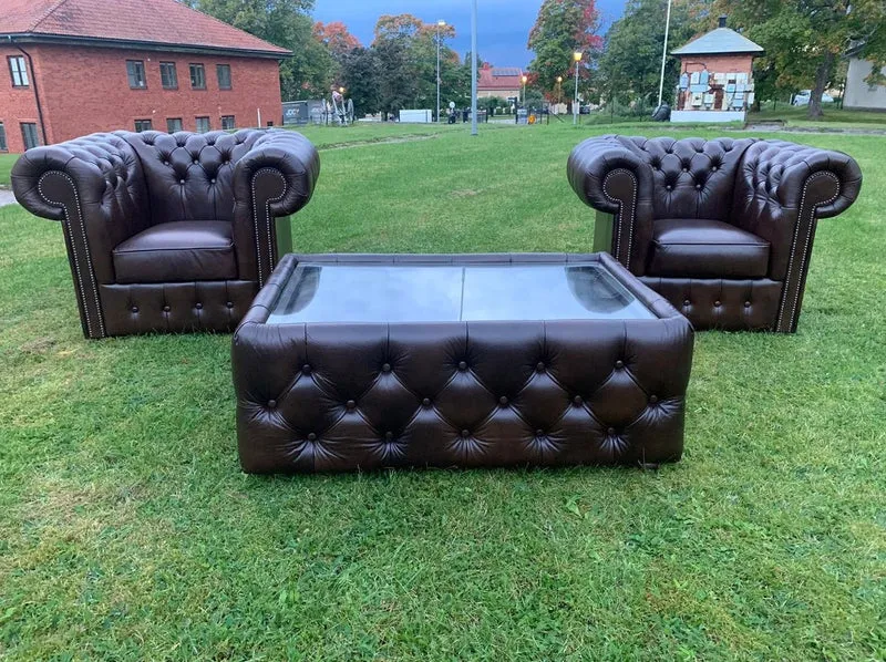 Casa Padrino Luxus Chesterfield Echtleder Couchtisch mit Glasplatte Schwarz