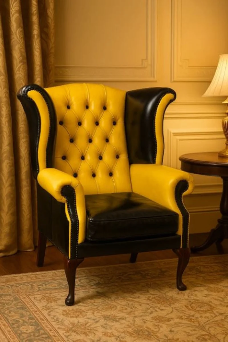 Casa Padrino Luxus Chesterfield Leder Ohrensessel Gelb / Schwarz / Braun H. 110 cm