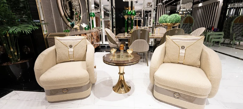 Casa Padrino Luxus Sessel Creme / Braun / Grau / Gold - Wohnzimmer Sessel - Hotel Sessel - Wohnzimmer Möbel - Hotel Möbel - Luxus Möbel