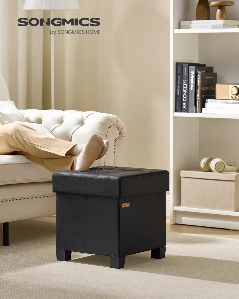 SONGMICS 15x15x15.7-Inch Cube Storage Ottoman with Legs. 10 Gal (37 L) Capacity. Synthetic Leather Footstool/Footrest.Ink Black