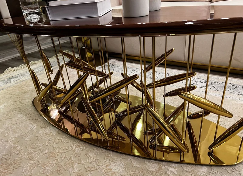 Casa Padrino Luxus Couchtisch Braun / Gold 120 x 51 x H. 47 cm - Ovaler Edelstahl Wohnzimmertisch mit Massivholz Tischplatte - Wohnzimmer Möbel - Hotel Möbel - Luxus Möbel