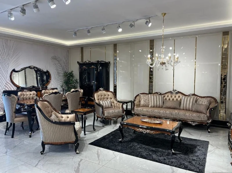 Casa Padrino Luxus Barock Wohnzimmer Sessel Gold / Braun / Schwarz / Silber - Handgefertigter Barockstil Sessel mit dekorativem Kissen - Luxus Wohnzimmer Möbel im Barockstil - Barock Möbel