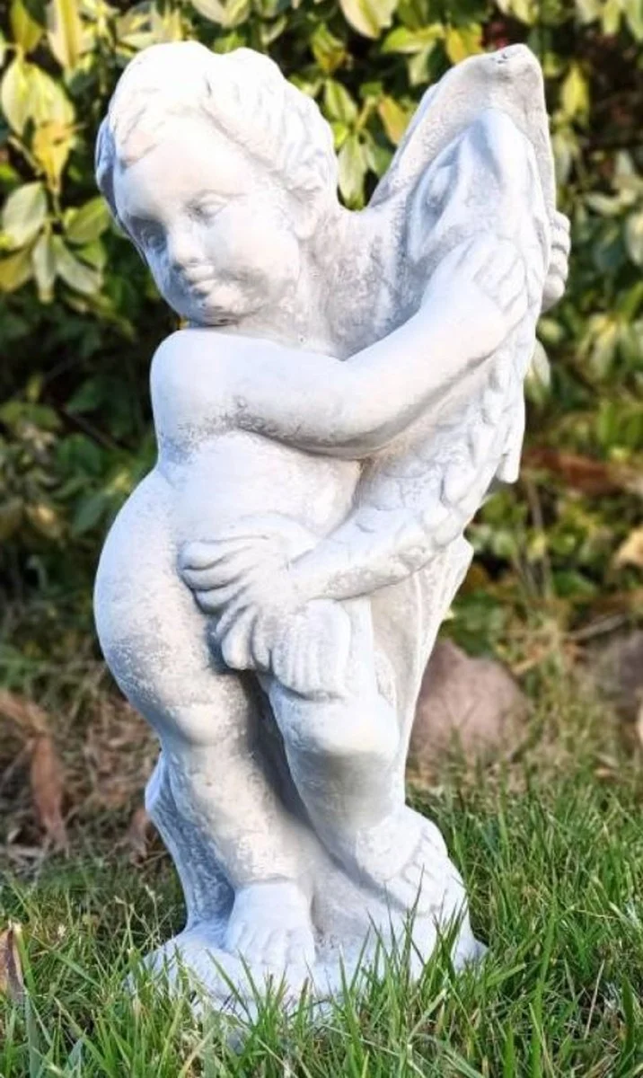 Casa Padrino Jugendstil Wasserspeier Skulptur Junge mit Fisch Grau H. 48 cm - Elegante Wasserspeier Stein Figur - Barock & Jugendstil Garten Deko Accessoires
