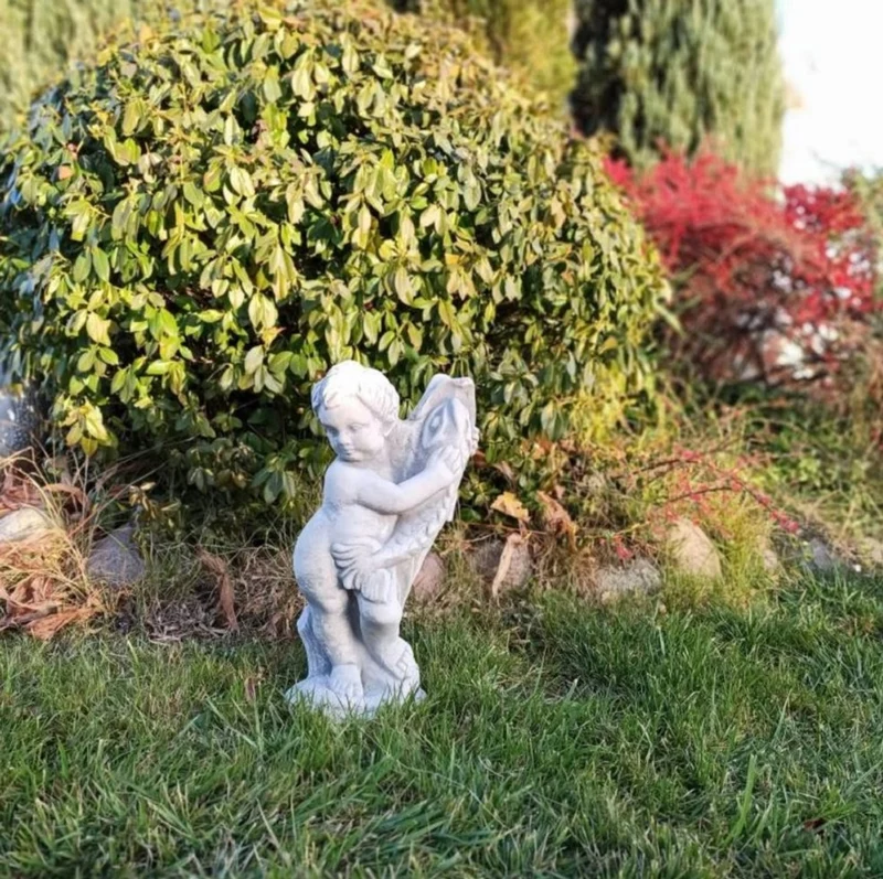 Casa Padrino Jugendstil Wasserspeier Skulptur Junge mit Fisch Grau H. 48 cm - Elegante Wasserspeier Stein Figur - Barock & Jugendstil Garten Deko Accessoires