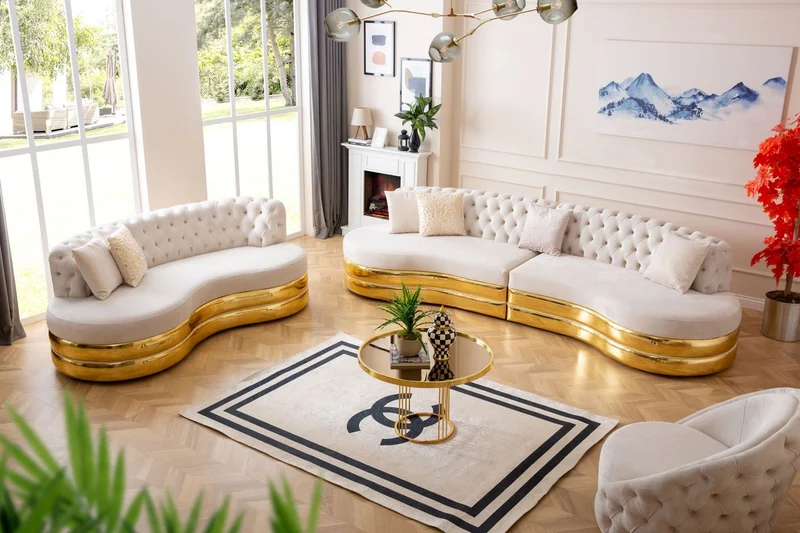 Casa Padrino Luxus Chesterfield 4er Sofa Creme / Gold 340 x 105 x H. 82 cm - Gebogenes Chesterfield Wohnzimmer Sofa - Wohnzimmer Möbel - Chesterfield Möbel - Luxus Möbel - Luxus Einrichtung