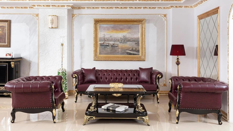 Casa Padrino Luxus Barock Chesterfield Sessel Bordeauxrot / Schwarz / Gold - Prunkvoller Wohnzimmer Sessel mit edlem Kunstleder - Barock Chesterfield Wohnzimmer Möbel
