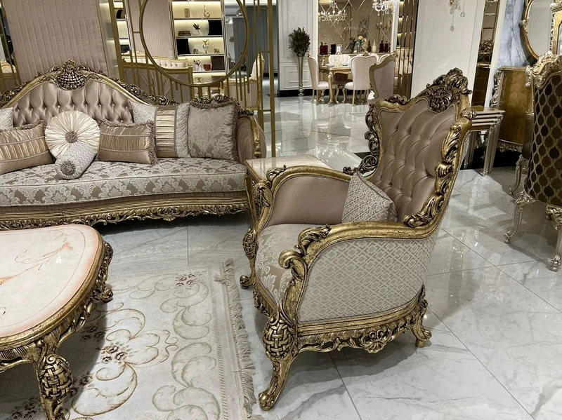 Casa Padrino Luxus Barock Wohnzimmer Sessel Braun / Weiß / Gold - Handgefertigter Barockstil Sessel mit elegantem Muster und dekorativem Kissen - Prunkvolle Barock Wohnzimmer Möbel