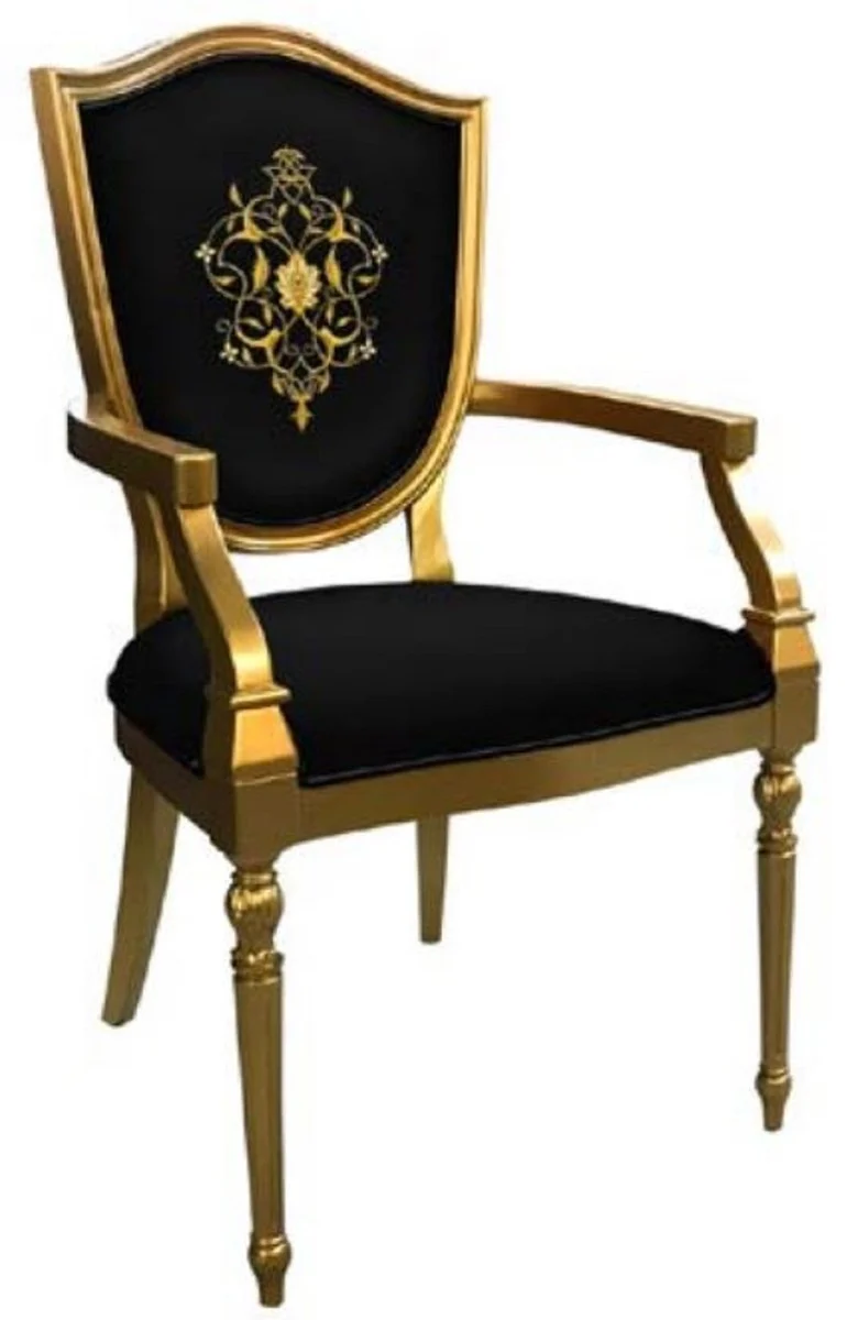 Casa Padrino Art Deco Esszimmerstuhl Schwarz / Gold - Massivholz Stuhl mit Armlehnen und elegantem Muster - Art Deco Esszimmer Möbel