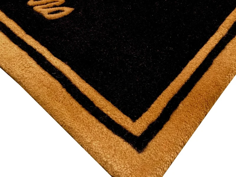 Casa Padrino Designer Fußmatte Schwarz / Gold 80 x 50 cm - Elegante Schmutzfangmatte - Deko Accessoires