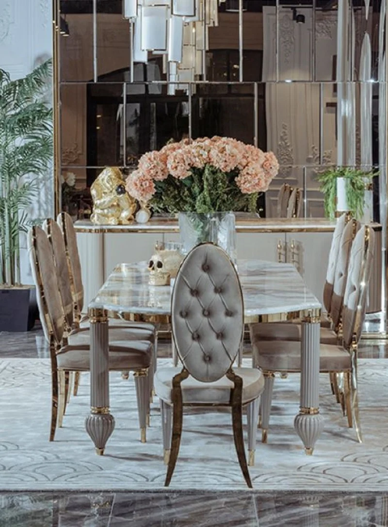 Casa Padrino Luxus Art Deco Esszimmer Set Grau / Weiß / Gold - 1 Art Deco Esstisch mit Kunstmarmor Tischplatte & 8 Art Deco Esszimmerstühle - Prunkvolle Art Deco Esszimmer Möbel - Luxus Qualität