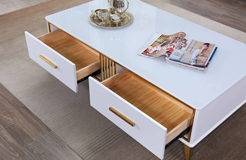 Casa Padrino Luxus Couchtisch Weiß / Gold 130 x 70 x H. 41 cm - Moderner Wohnzimmertisch mit 2 Schubladen - Moderne Wohnzimmer Möbel