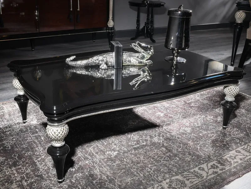 Casa Padrino Luxus Barock Couchtisch Schwarz / Silber - Handgefertigter Massivholz Wohnzimmertisch im Barockstil - Barock Wohnzimmer Möbel