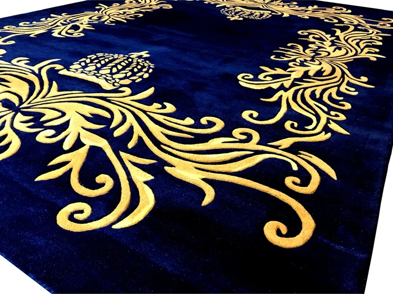 Pompöös by Casa Padrino Luxus Teppich von Harald Glööckler 160 x 230 cm Krone Royalblau / Gold - Barock Design Teppich - Handgewebt aus Wolle
